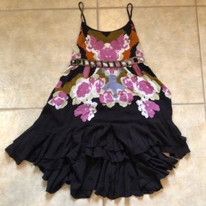 NWOT. Free People Mini Dress with back details.